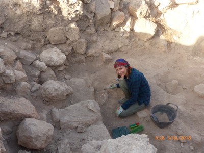 Salama Kassem excavating her tabun.jpg