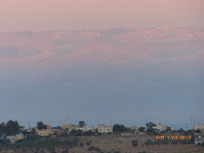 sunrise and Jerusalem in the distance.jpg